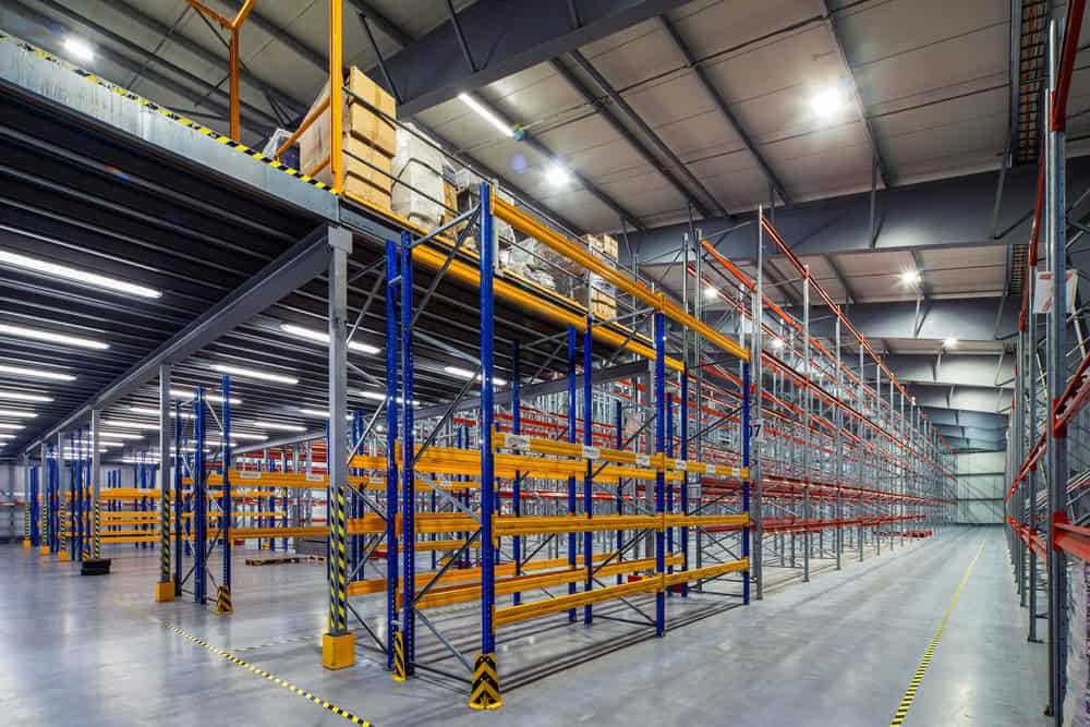modern,interior,of,new,empty,warehouse.,racks,pallets,shelves.,metal