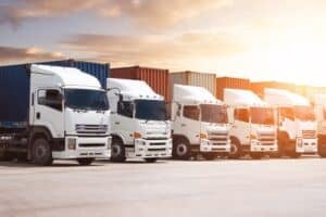 row,of,semi,trailer,trucks,on,the,parking,lot,at
