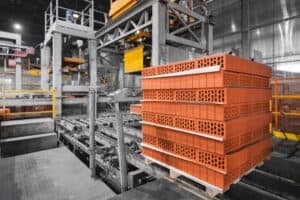automated,brick,production,packing,and,conveyor,transport,at,manufacturing,plant.